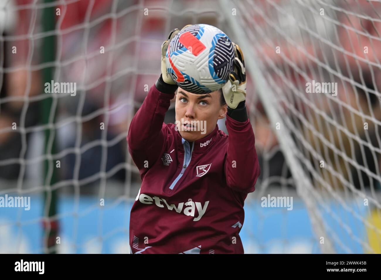 Dagenham on Sunday 24th March 2024. Goalkeeper Mackenzie Arnold (1 West Ham) warms up during the Barclays FA Women's Super League match between West Ham United and Chelsea at the Chigwell Construction Stadium, Dagenham on Sunday 24th March 2024. (Photo: Kevin Hodgson | MI News) Credit: MI News & Sport /Alamy Live News Stock Photo