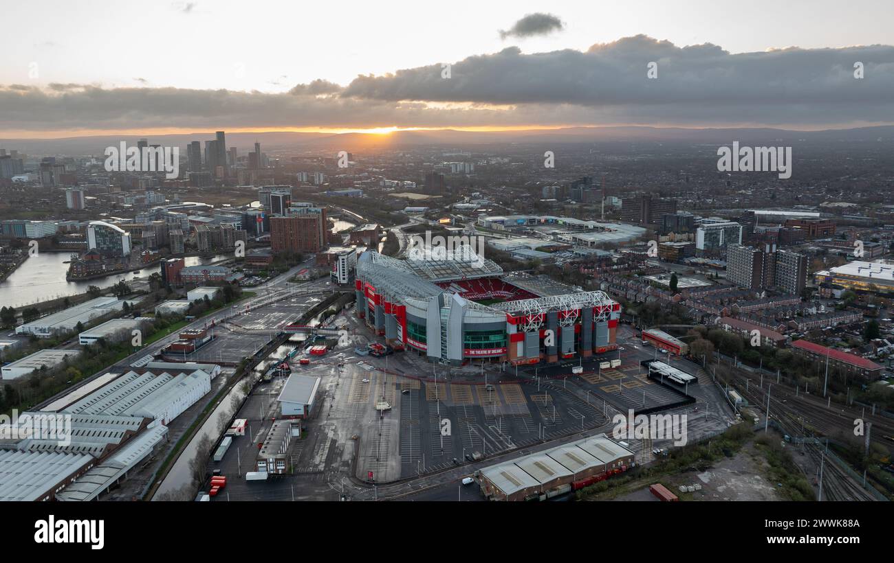 Sunrise over Old Trafford soccer football stadium of Manchester United - MANCHESTER, UNITED KINGDOM - MARCH 28TH 2024 Stock Photo