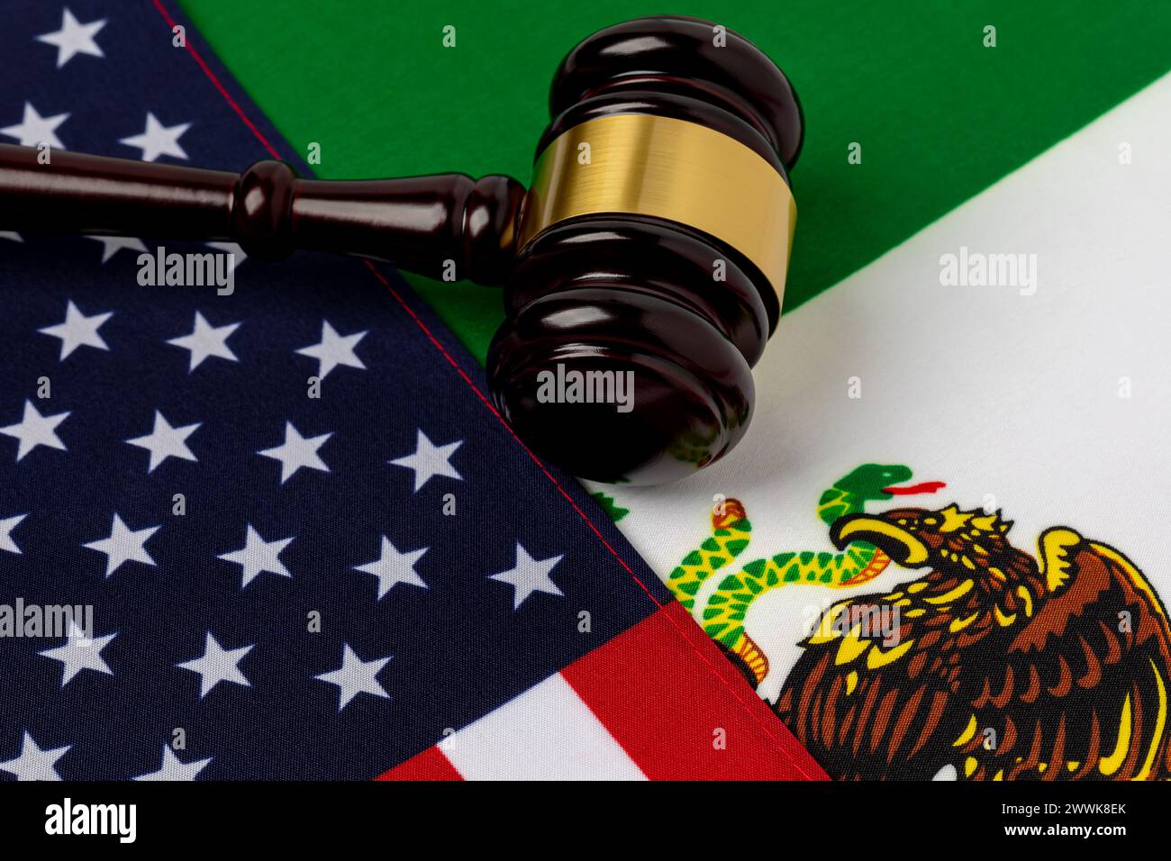 United States and Mexico flags with gavel. Border security, immigration reform and asylum law concept. Stock Photo