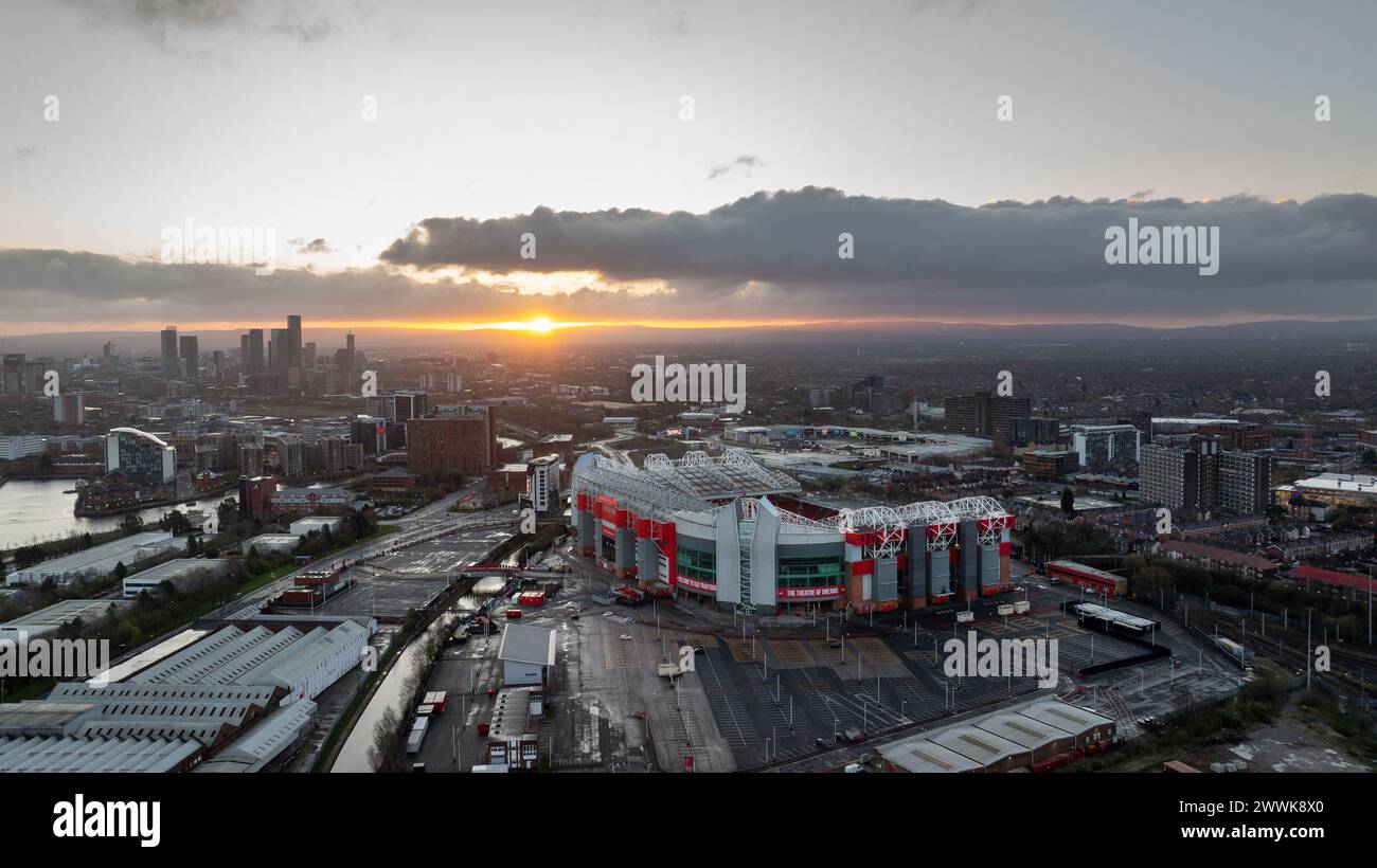 Sunrise over Old Trafford soccer football stadium of Manchester United - MANCHESTER, UNITED KINGDOM - MARCH 28TH 2024 Stock Photo