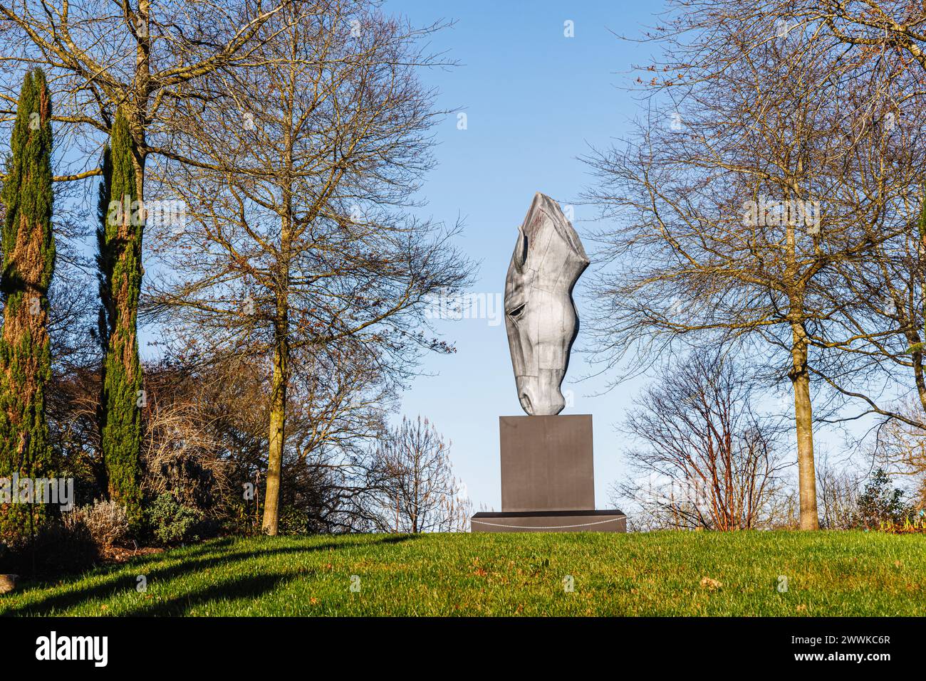 Large ‘Still Water’ metallic sculpture of a horse's head by Nic FiddianGreen at the top of