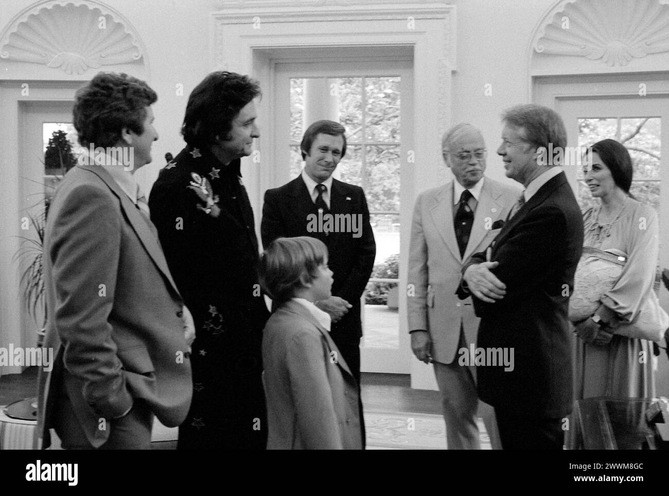 Jimmy Carter with Johnny Cash and family, June 1977 - White House photographer Stock Photo