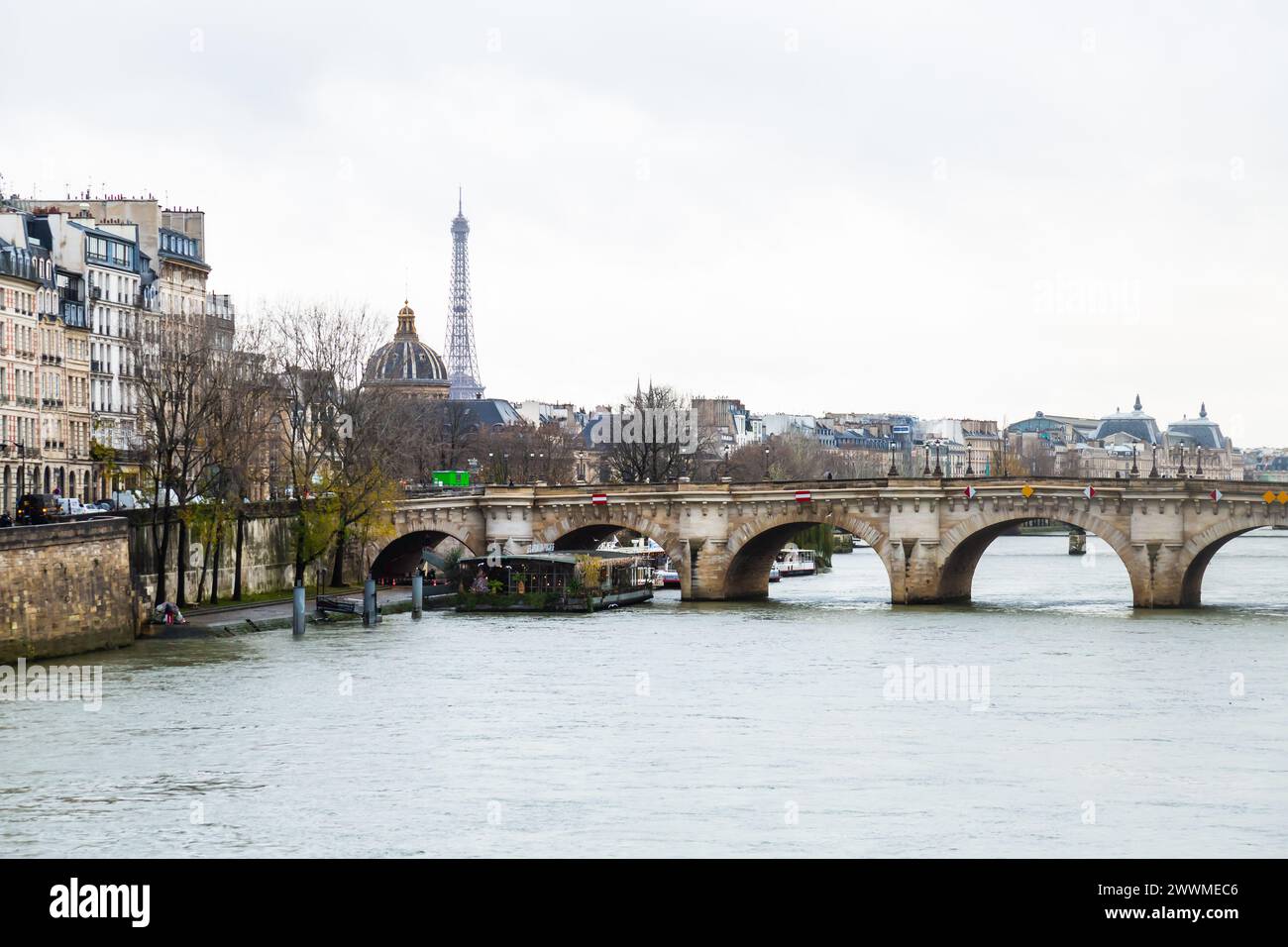 5th December 2023- The Pont Neuf with the Eiffel Tower in the background. The Pont Neuf (New Bridge) is one of the most iconic bridges in Paris, Franc Stock Photo