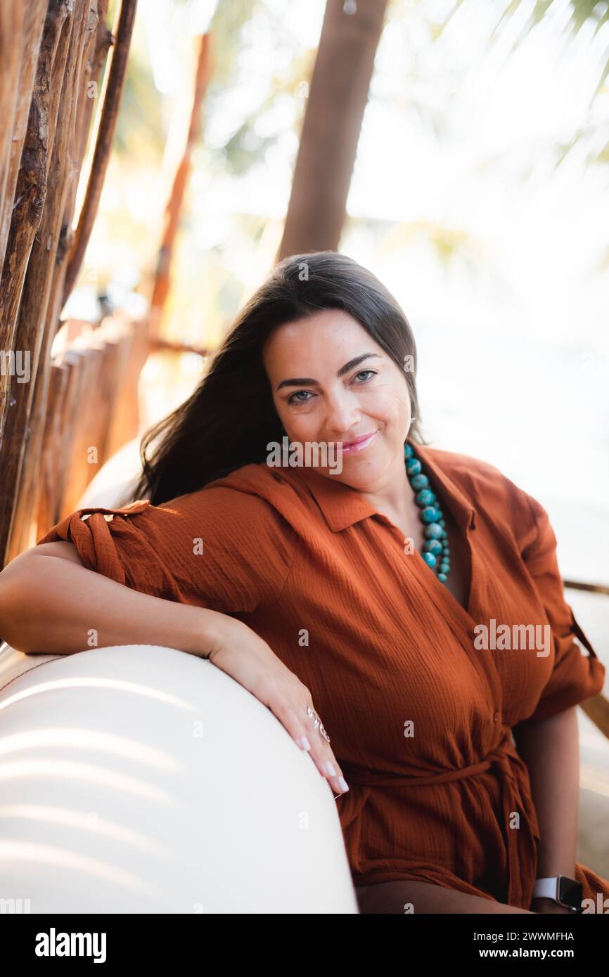 Woman posing in tropical setting Stock Photo