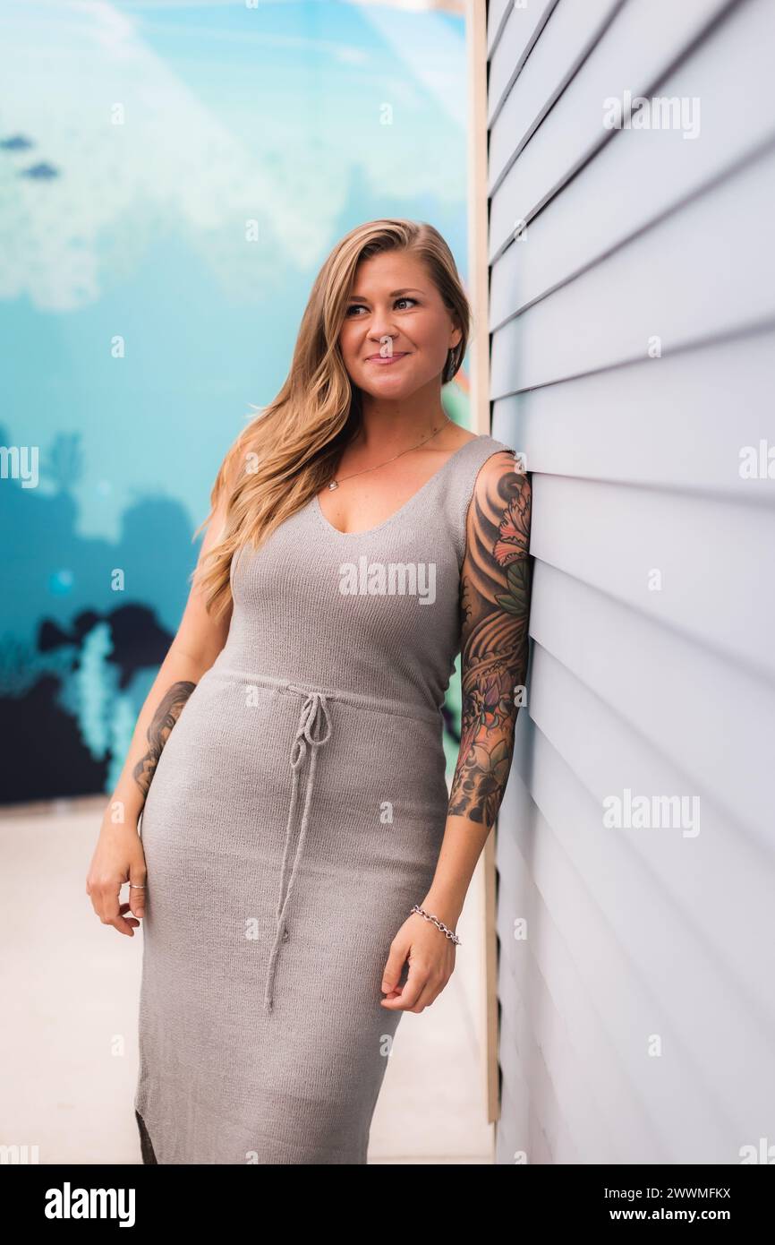 Women with tattoos hi-res stock photography and images - Alamy, image size:866x1390