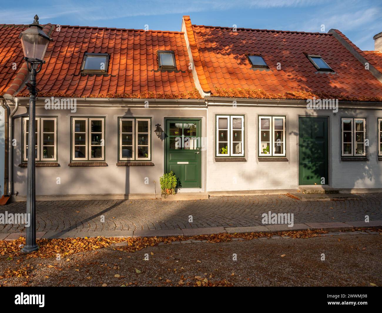 Charming historic houses lining Torvet Square in old town of Bogense, Funen, Denmark Stock Photo