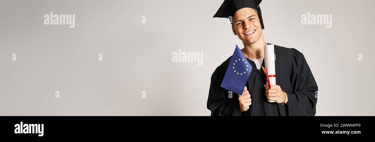 banner of guy in graduate outfit posing with diploma and european flag ...
