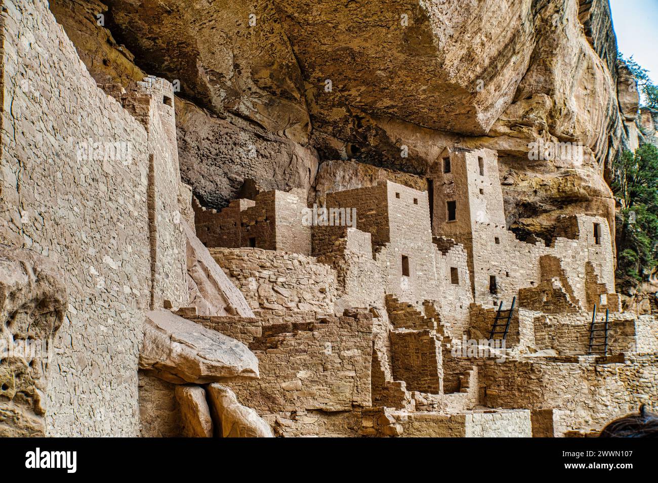 The remarkable ancient multifloor cliff dwellings constructed under a massive rock shelter Stock Photo