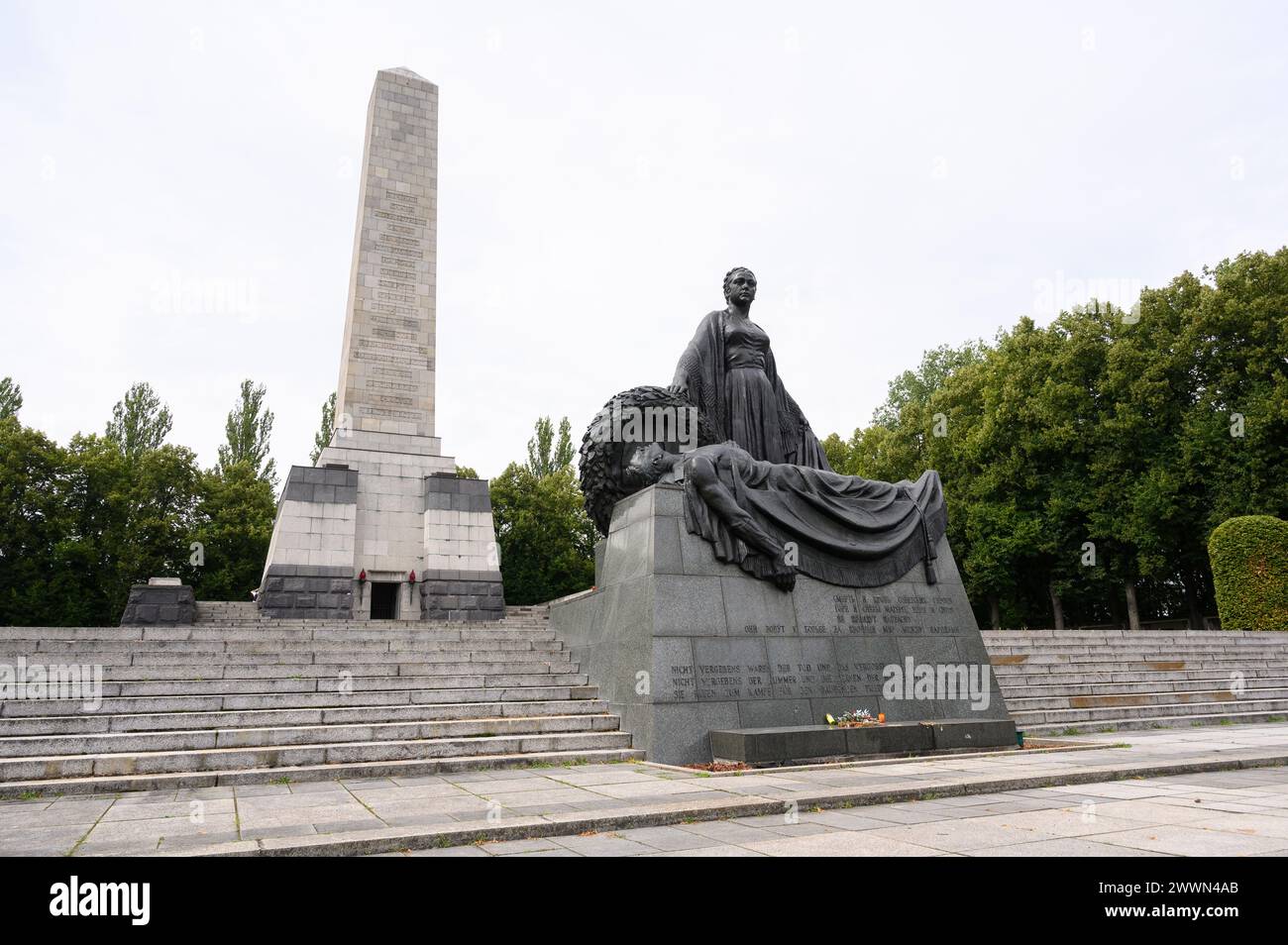 Berlin. Germany. The Soviet War Memorial in Schönholzer Heide (Sowjetisches Ehrenmal in der Schönholzer Heide).  Mother Russia mourning a fallen soldi Stock Photo
