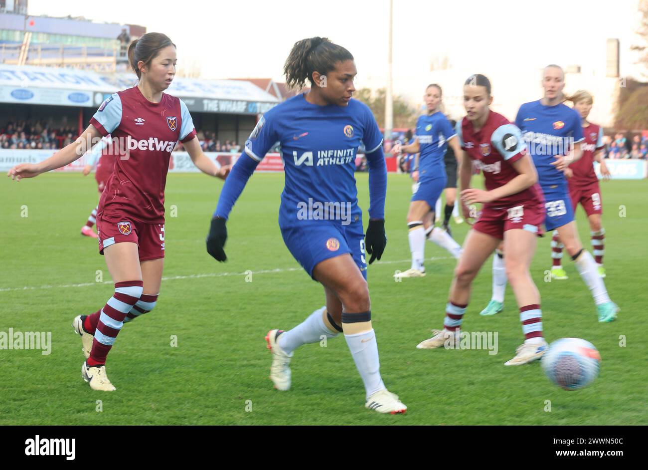 DAGENHAM, ENGLAND - MARCH 24:L-R Risa Shimizu of West Ham United WFC and Chelsea Women Caiarina Macario in action  during Barclays FA Women's Super Le Stock Photo