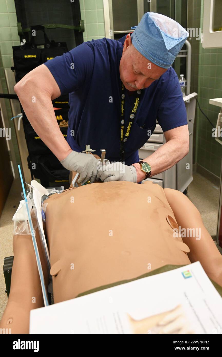 The Kimbrough Ambulatory Care Center Anesthesia Care Team simulated various methods of performing  an emergency cricothyrotomy, Fort Meade, Maryland, Feb. 5, to validate providers' skills and update credentials. A cricothyrotomy is an incision made through the skin and cricothyroid membrane to establish a patent airway during certain life-threatening situations, such as airway obstruction by a foreign body, angioedema, or massive facial trauma. Defense Health Agency Stock Photo