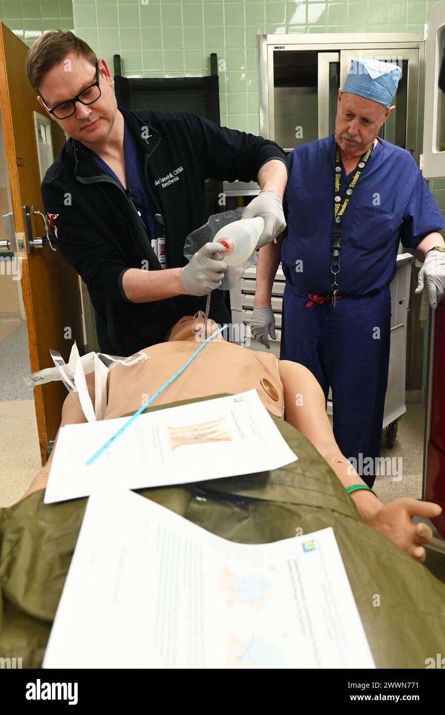 The Kimbrough Ambulatory Care Center Anesthesia Care Team simulated various methods of performing  an emergency cricothyrotomy, Fort Meade, Maryland, Feb. 5, to validate providers' skills and update credentials. A cricothyrotomy is an incision made through the skin and cricothyroid membrane to establish a patent airway during certain life-threatening situations, such as airway obstruction by a foreign body, angioedema, or massive facial trauma. Defense Health Agency Stock Photo