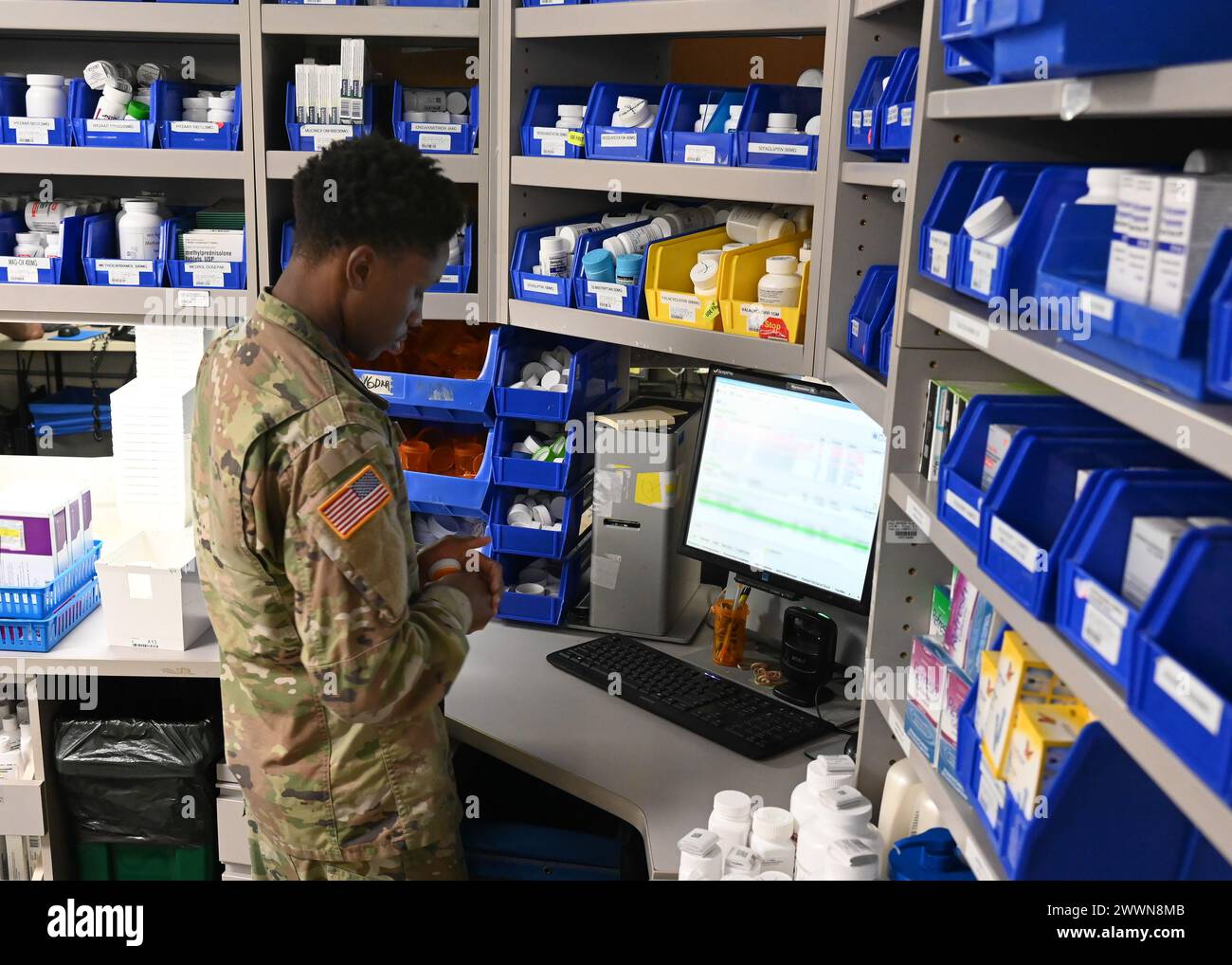 Spc. Chy Lee Ethridge, a pharmacy technician at Kimbrough Ambulatory Care Center, prepares medication requests at the Main Pharmacy for TRICARE beneficiaries on Fort Meade, Maryland, Feb. 12. (Defense Health Agency Stock Photo