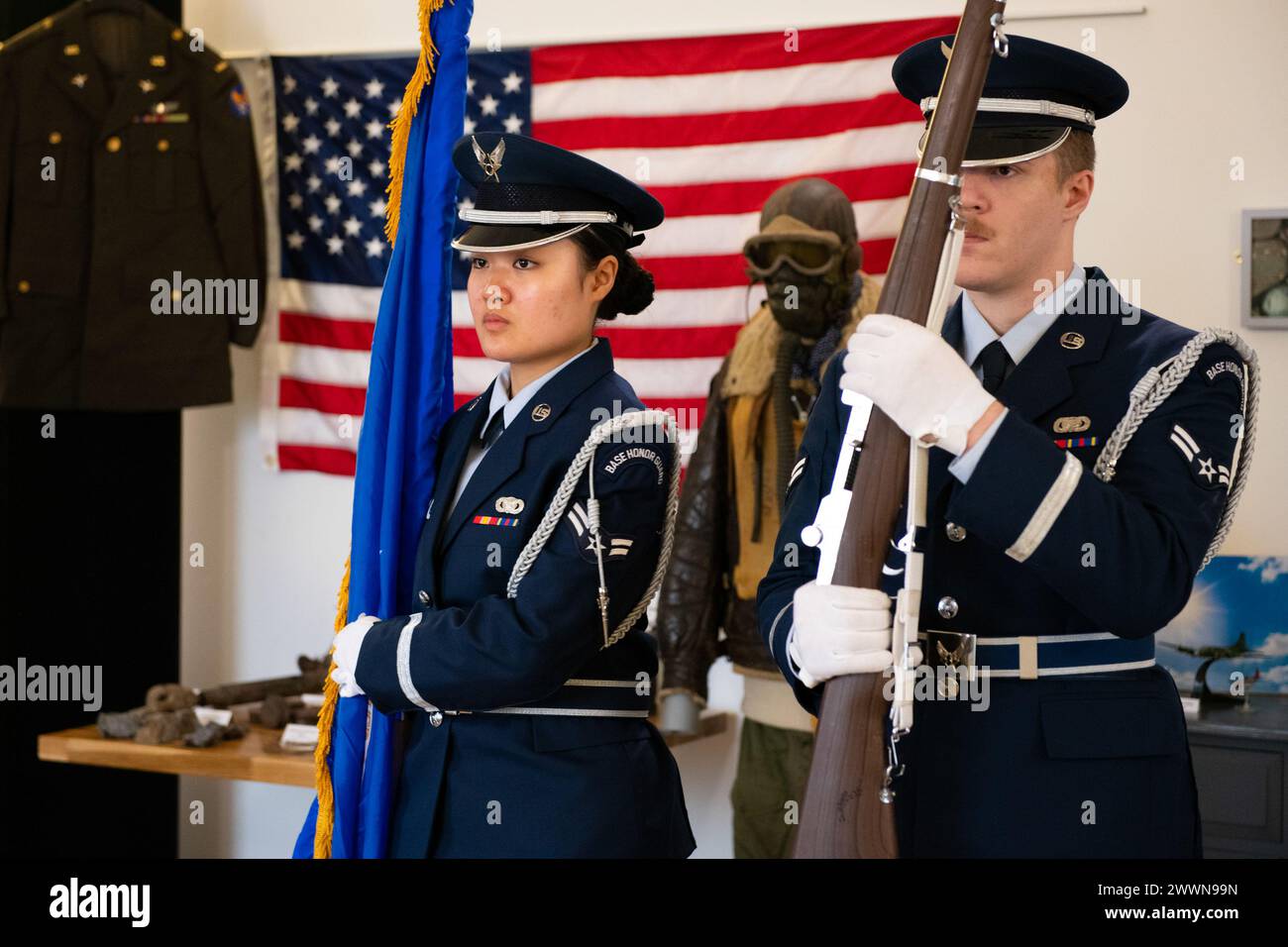U.S. Air Force Airmen 1st Class Christina Selkor, left, and Spencer Eagan, right, 501st Combat Support Wing Honor Guard team members, present the colors during a Ceremony of Remembrance at Stanwick Lakes, England, Feb. 22, 2024. U.S. and U.K. leaders gathered to honor 17 Airmen who died in a midair collision on Feb. 22, 1944, involving B-17 Flying Fortresses from the 303rd Bombardment Group at RAF Molesworth and the 384th Bombardment Group at RAF Grafton Underwood. The Airmen were part of Operation Argument, or 'The Big Week,' targeting enemy industrial sites and aircraft facilities in Central Stock Photo