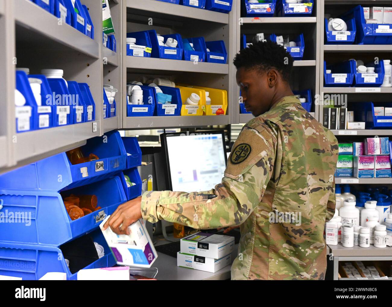 Spc. Chy Lee Ethridge, a pharmacy technician at Kimbrough Ambulatory Care Center, prepares medication requests at the Main Pharmacy for TRICARE beneficiaries on Fort Meade, Maryland, Feb. 12. (Defense Health Agency Stock Photo