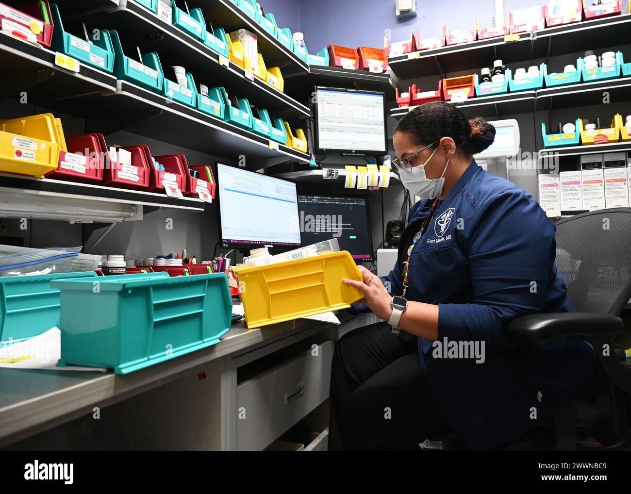 A pharmacy technician at Kimbrough Ambulatory Care Center prepares medication requests at the Main Pharmacy for TRICARE beneficiaries on Fort Meade, Maryland, Feb. 12. (Defense Health Agency Stock Photo