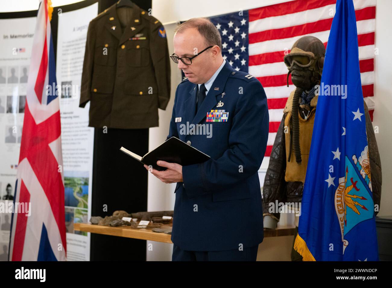 U.S. Air Force Chaplain (Capt) Steven Davis, 501st Combat Support Wing chaplain, delivers an invocation during a Ceremony of Remembrance at Stanwick Lakes, England, Feb. 22, 2024. U.S. and U.K. leaders gathered to honor 17 Airmen who died in a midair collision on Feb. 22, 1944, involving B-17 Flying Fortresses from the 303rd Bombardment Group at RAF Molesworth and the 384th Bombardment Group at RAF Grafton Underwood. The Airmen were part of Operation Argument, or 'The Big Week,' targeting enemy industrial sites and aircraft facilities in Central Europe to secure Allied air superiority for the Stock Photo