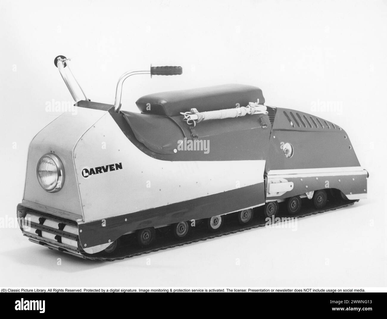 'Larven' (The caterpillar) A Swedish unconventional snowmobile that has now reached cult status. It consisted of a long caterpillar track with a seat where the driver sat and steered with the help of his weight and with his skis. It was launched in 1965 and manufactured by the company Lenko in Östersund, founded by Lennart Nilsson. When it was launched, it cost SEK 3,000. About 4,500 examples were built in total. Top speed was 48 km/h. The caterpillar was propelled forward with fiberglass-reinforced plastic bands. The caterpillar was 178 cm long, 81 cm wide with a total weight of 76 kg. Alumin Stock Photo