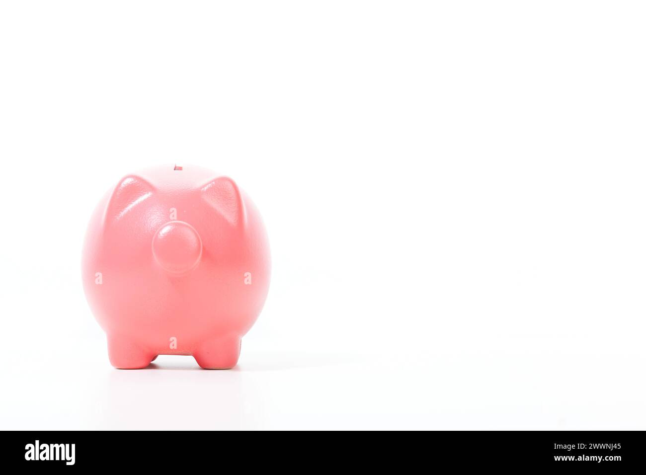 Piggy bank isolated on white background Stock Photo - Alamy