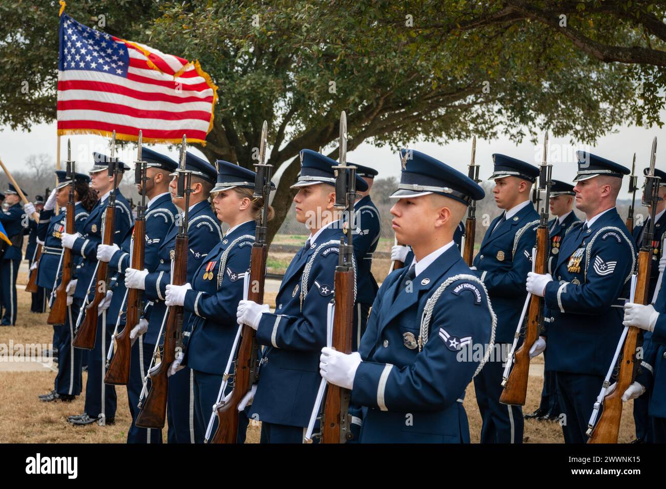 The U.S. Air Force Honor Guard stand ready during the interment of ...
