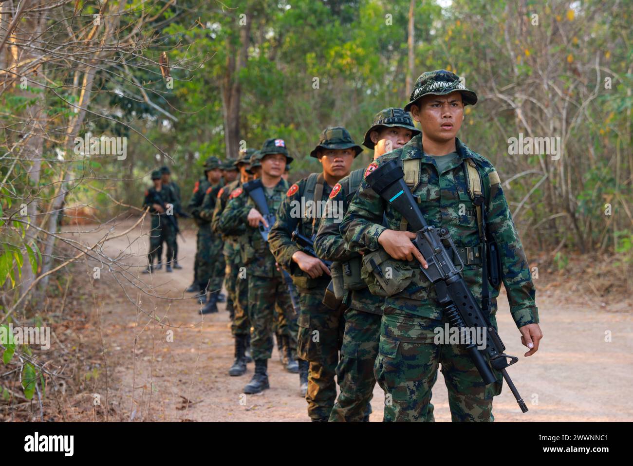 Royal Thai Marines prepare to patrol during jungle tactics training at Exercise Cobra Gold in Chanthaburi province, Thailand, Feb. 29, 2024. Cobra Gold, now in its 43rd year, is a Thai-U.S. co-sponsored training event that builds on the long-standing friendship between the two allied nations and brings together a robust multinational force to promote regional peace and security in support of a free and open Indo-Pacific.  Marine Corps Stock Photo