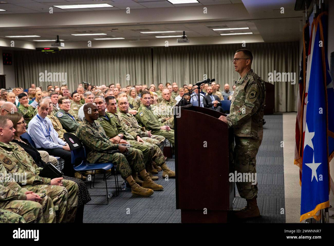 General Gregory Guillot, Commander, North American Aerospace Defense Command and U.S. Northern Command, addresses the headquarters staff, in-person and via live stream, to introduce himself and provide his initial plans for the way forward for the Commands during his tenure. More than 260 members filled the NORAD and USNORTHCOM training rooms to listen to the general’s first address to the staff since assuming the leadership position Feb. 5, 2024. (Department of Defense Stock Photo