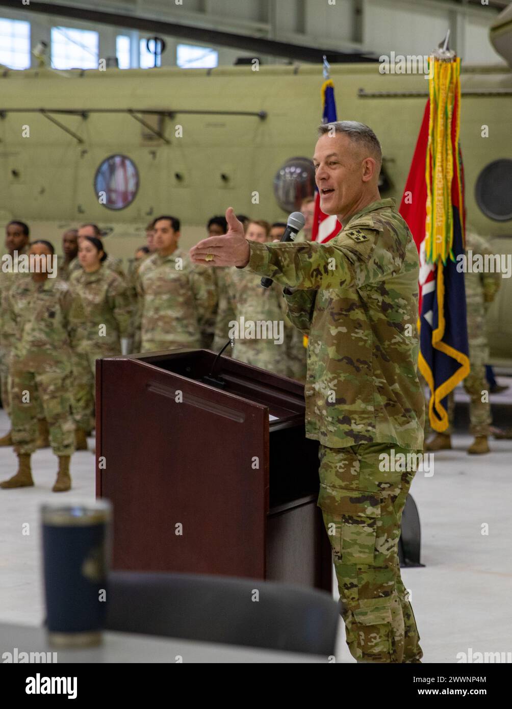 Maj. Gen. David Doyle, commanding general of the 4th Infantry Division, gives a speech during the 2024 Lt. Gen. Ellis D. Parker Award ceremony for best combat Service Support in the Department of the U.S. Army at 404th ASB Hangar, Fort Carson, Colorado on Feb. 12th, 2024. The award recognized excellence and encouraged innovative use of existing management tools and resources.  Army Stock Photo