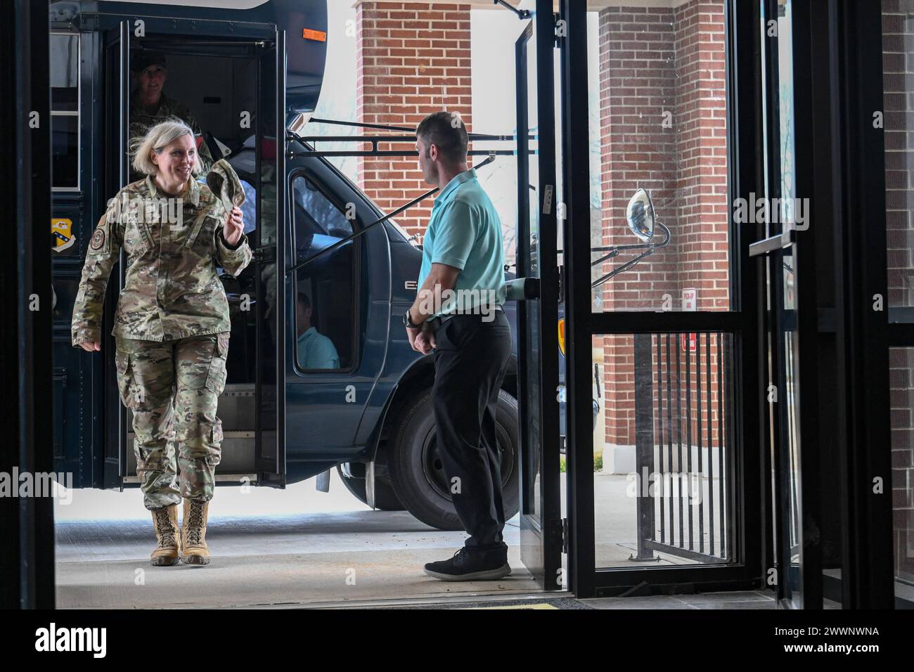 Brig. Gen. Leigh Swanson, Air Mobility Command command surgeon, enters ...