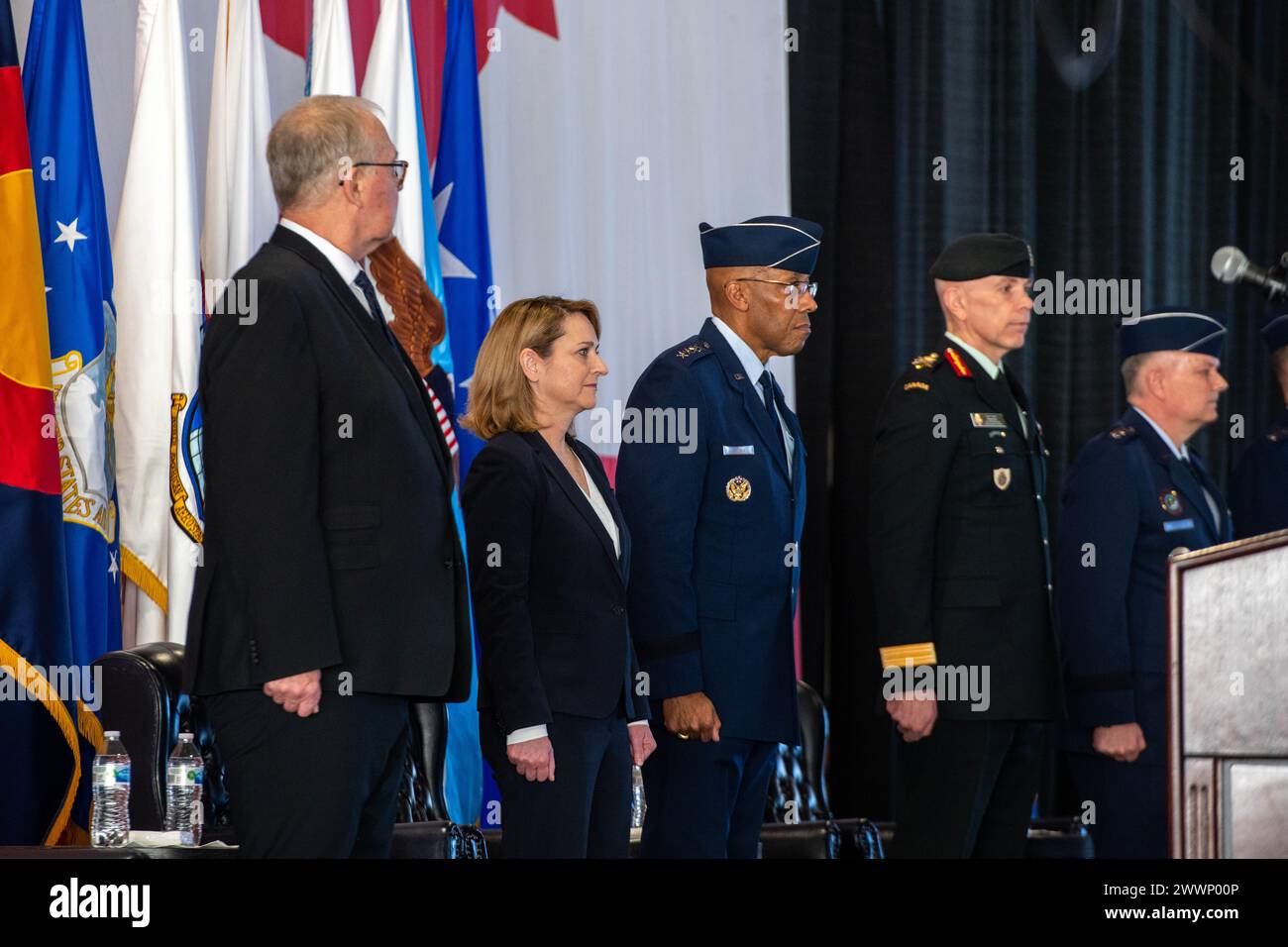 Members of the official party stand at attention during the U.S ...