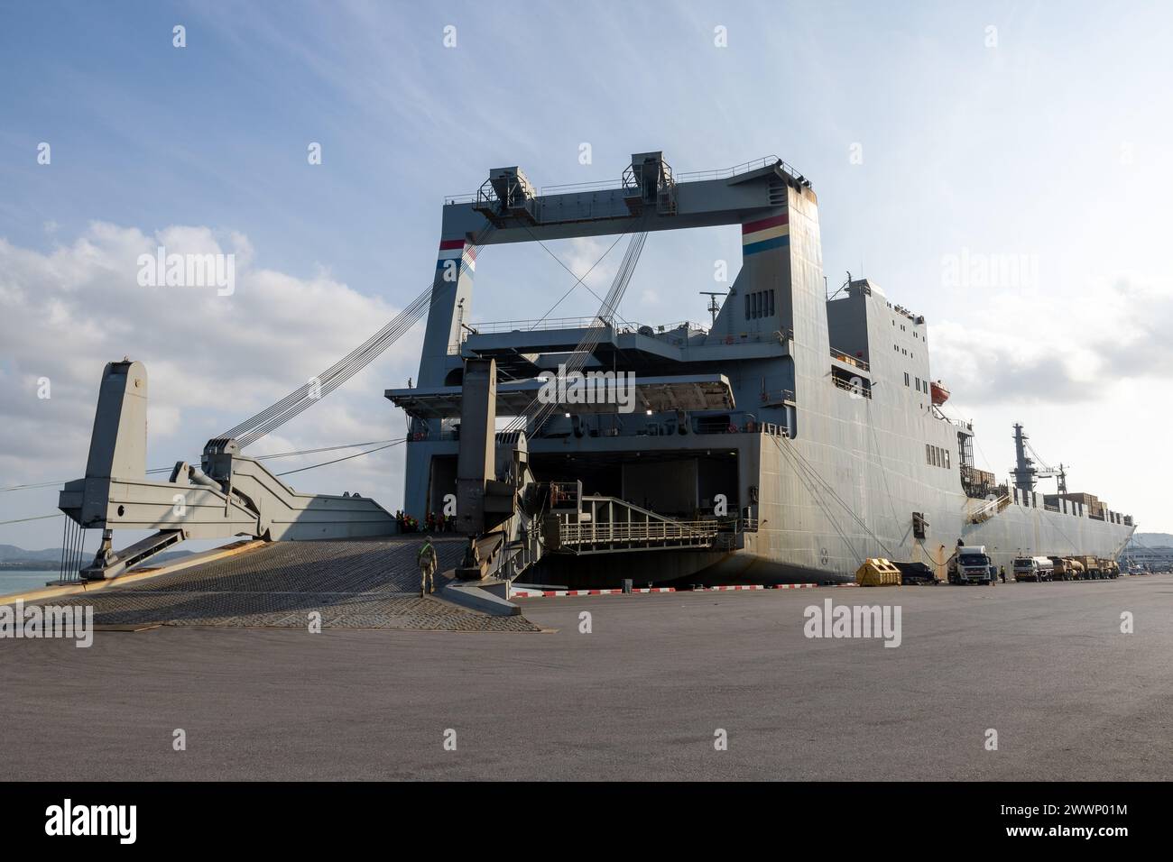 Military Sealift Command (MSC) chartered ship MV Cape Horn (T-AKR 5068) sits pier side prior to an offload for exercise Cobra Gold 2024, at the port of Sattahip, Thailand, Feb. 19. CG24 is the 43rd iteration of the Joint Cobra Gold series of exercises. CG24 emphasizes coordination on readiness, civic action, humanitarian assistance and disaster relief, and seeks to expand regional cooperation and collaboration in these vital areas. MSC directs and supports operations for approximately 140 civilian-crewed ships that replenish U.S. Navy ships at sea, conduct specialized missions, preposition com Stock Photo