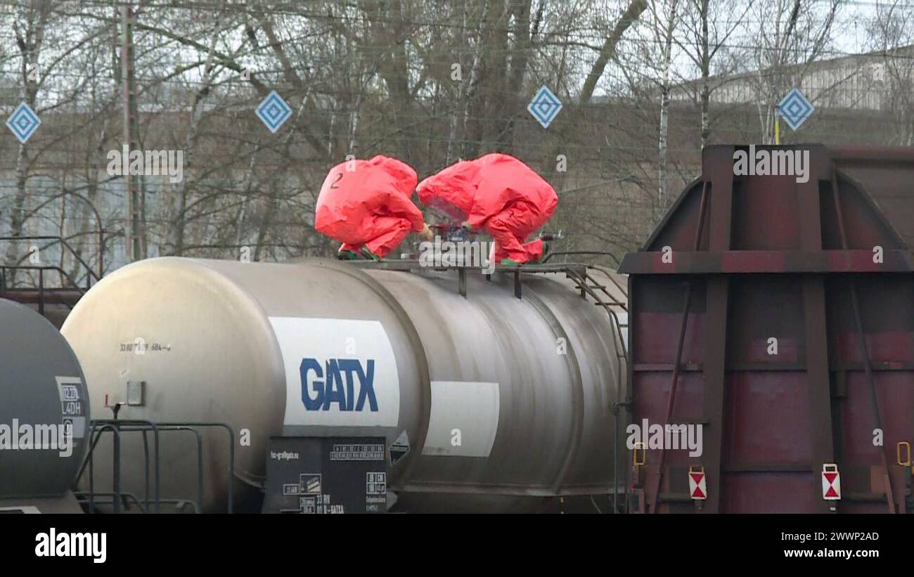 25 March 2024, Lower Saxony, Hanover: NBC emergency services work on a tank wagon. Small quantities of nitric acid are thought to have leaked from a parked tank wagon at the Linden-Fischerhof freight yard in Hanover. Photo: -/dpa Stock Photo