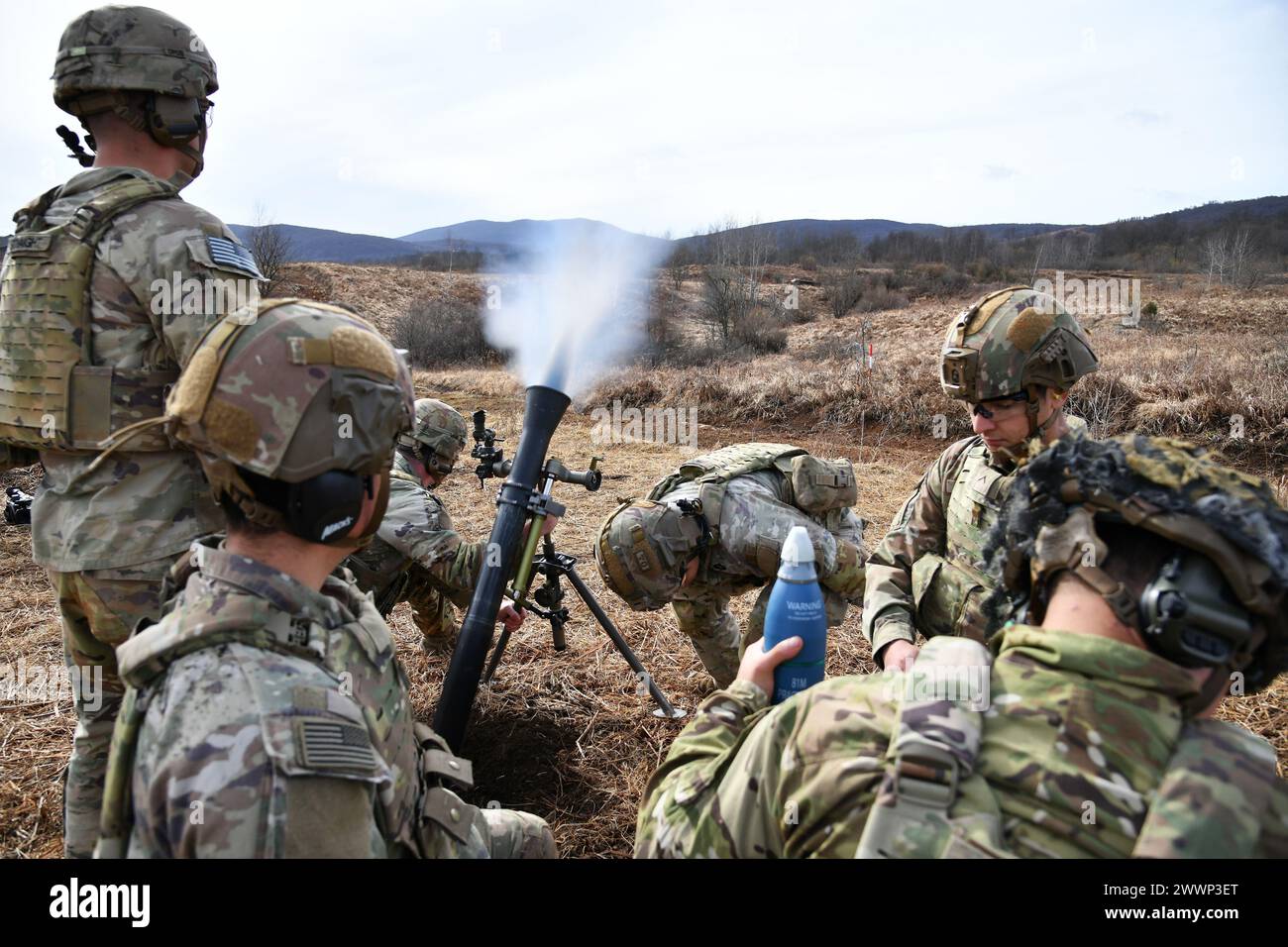 U.S. Army Paratroopers assigned to the 1st Battalion, 503rd Infantry Regiment, 173rd Airborne Brigade fire an M252 81 mm mortar system during Eagle Ursa exercise at the training range in Slunj, Croatia, Feb. 24, 2024. The 173rd Airborne Brigade is the U.S. Army's Contingency Response Force in Europe, providing rapidly deployable forces to the United States European, African, and Central Command areas of responsibility. Forward deployed across Italy and Germany, the brigade routinely trains alongside NATO allies and partners to build partnerships and strengthen the alliance.  Army Stock Photo