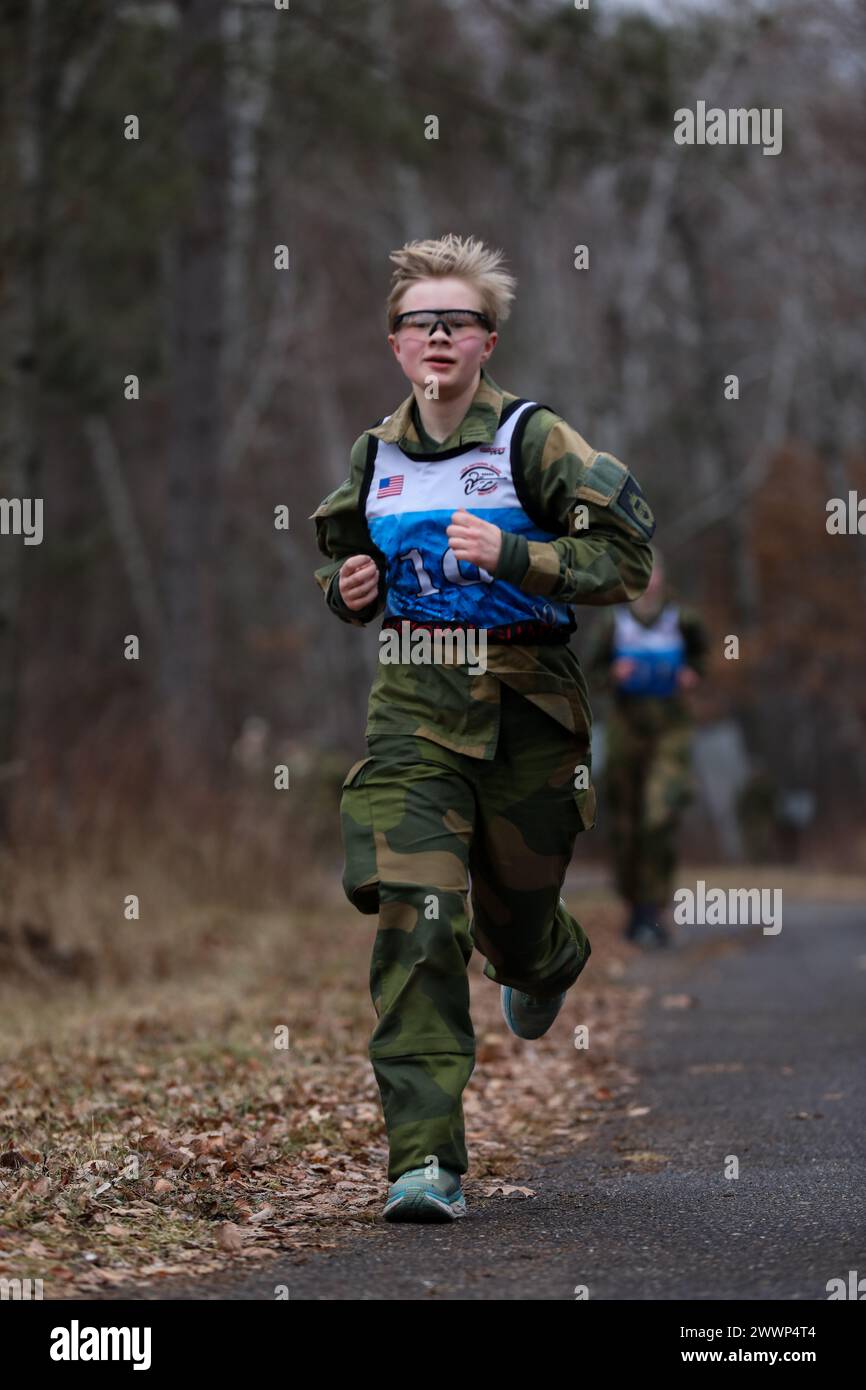 The Norwegian Home Guard Youth run a Biathlon at Camp Ripley Training Center in Little Falls, Minnesota, on February 7th, 2024. The Norwegian Home Guard is training with the Minnesota National Guard as a part of the 51st annual Norwegian Reciprocal Troop Exchange (Minnesota Army National Guard Stock Photo