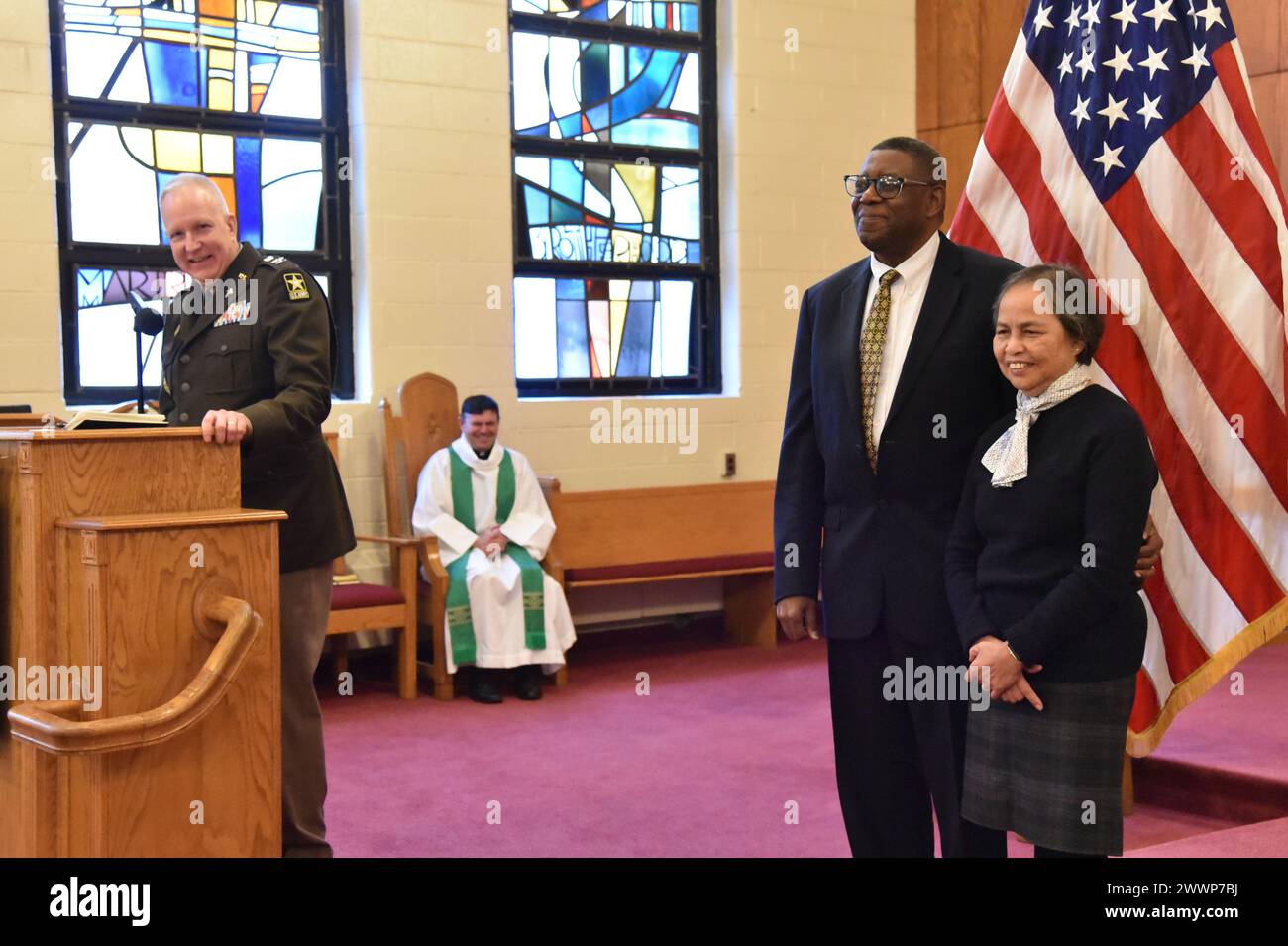 Chaplain (Col.) Jim Fisher provides remarks prior to presenting the ...