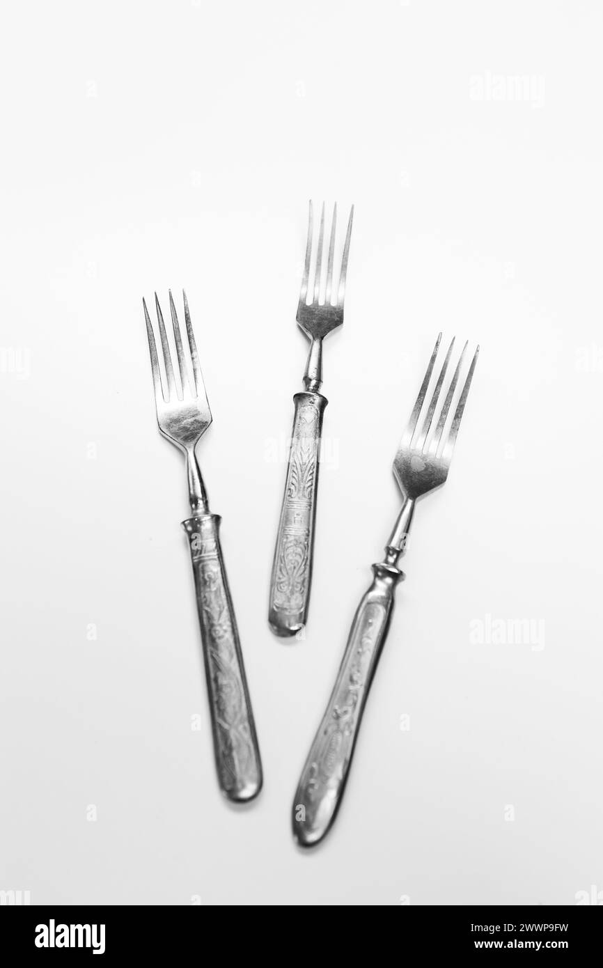 Old metal forks isolated on a white background Stock Photo Alamy