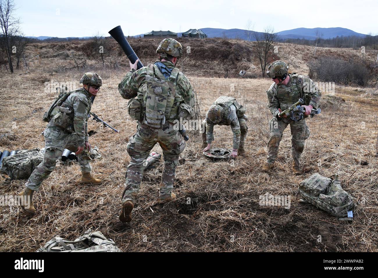 U.S. Army Paratroopers assigned to the 1st Battalion, 503rd Infantry Regiment, 173rd Airborne Brigade prepare an  M252 81 mm mortar system during Eagle Ursa exercise at the training range in Slunj, Croatia, Feb. 24, 2024. The 173rd Airborne Brigade is the U.S. Army's Contingency Response Force in Europe, providing rapidly deployable forces to the United States European, African, and Central Command areas of responsibility. Forward deployed across Italy and Germany, the brigade routinely trains alongside NATO allies and partners to build partnerships and strengthen the alliance.  Army Stock Photo