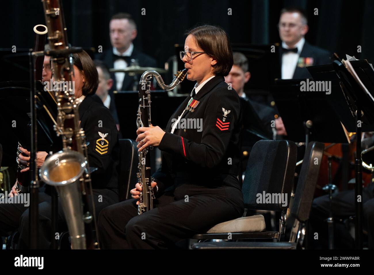 240213-N-PN185-2008 – Huntsville, Alabama (Feb. 13, 2024)  - Musician 1st Class Sarah Demy, from Burke, Virginia, performs during the United States Navy Band 2024 national tour concert at Huntsville High School.  The Navy Band will travel 2500 ground miles over 18 days to 7 states, giving 12 public concerts as well as 5 concerts for students in schools.  Navy Stock Photo