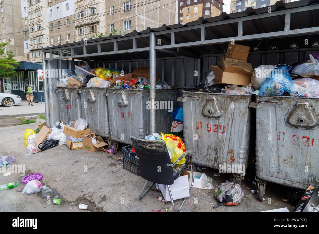 overfilled public trash bins at summer day in Bishkek, Kyrgyzstan Stock ...