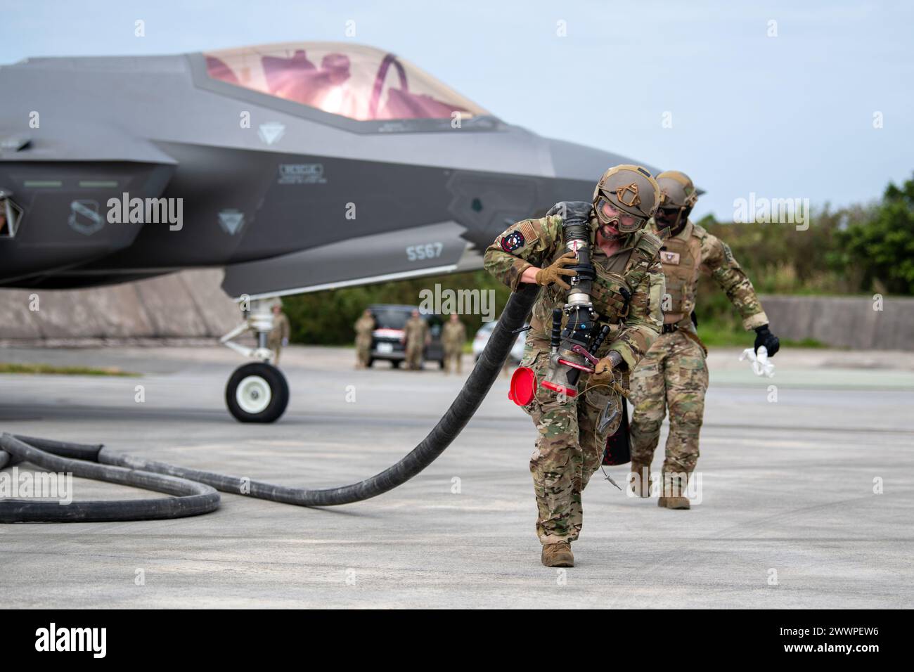 Two U.S. Air Force Airmen with the 18th Logistics Readiness Squadron ...