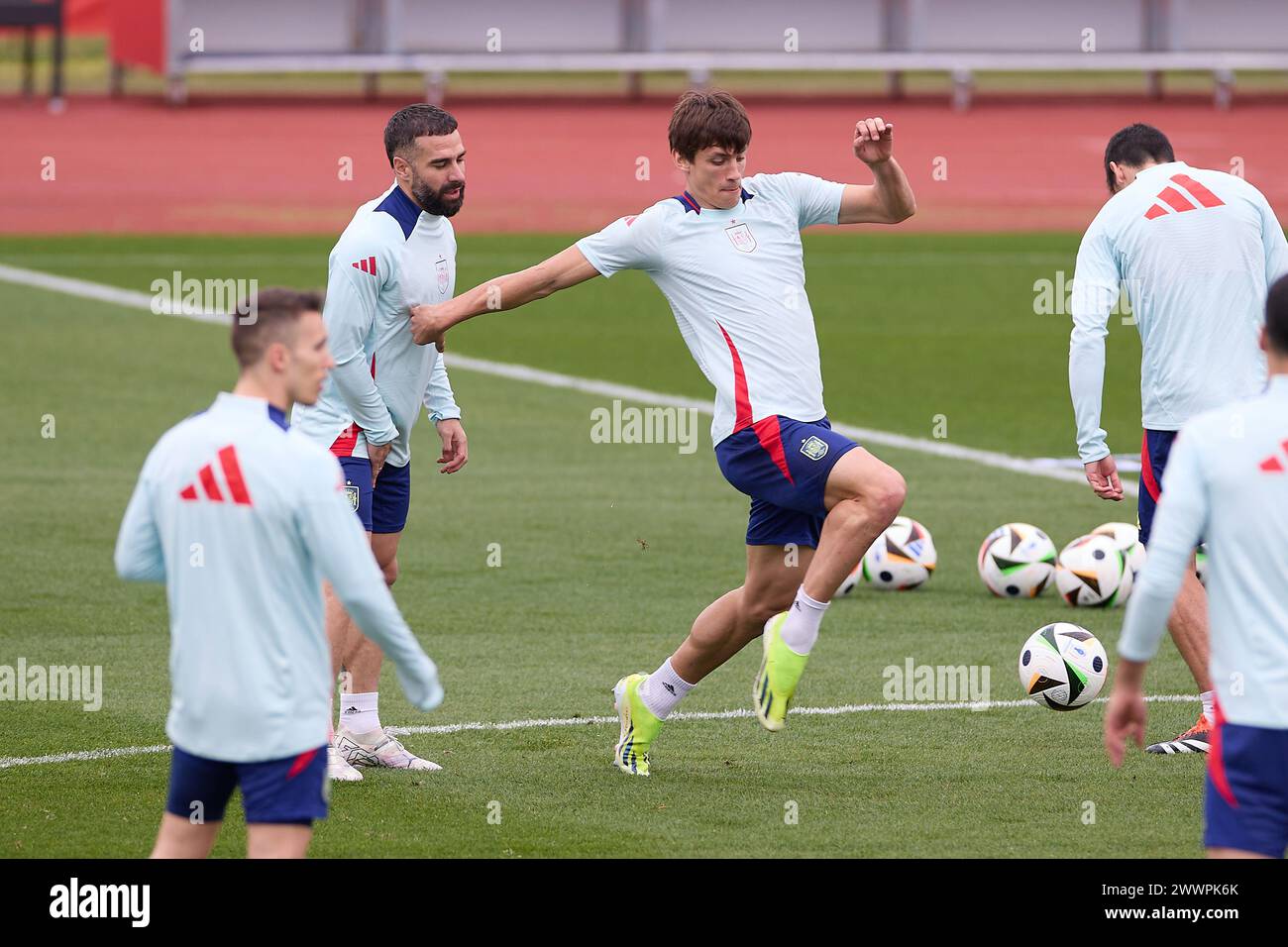 Madrid, Spain. 25th Mar, 2024. Daniel Carvajal (L) and Robin Le Normand (R) of Spain warm up during the training session on the eve of the international friendly match between Spain and Brazil at Ciudad del Fútbol de Las Rozas. (Photo by Federico Titone/SOPA Images/Sipa USA) Credit: Sipa USA/Alamy Live News Stock Photo
