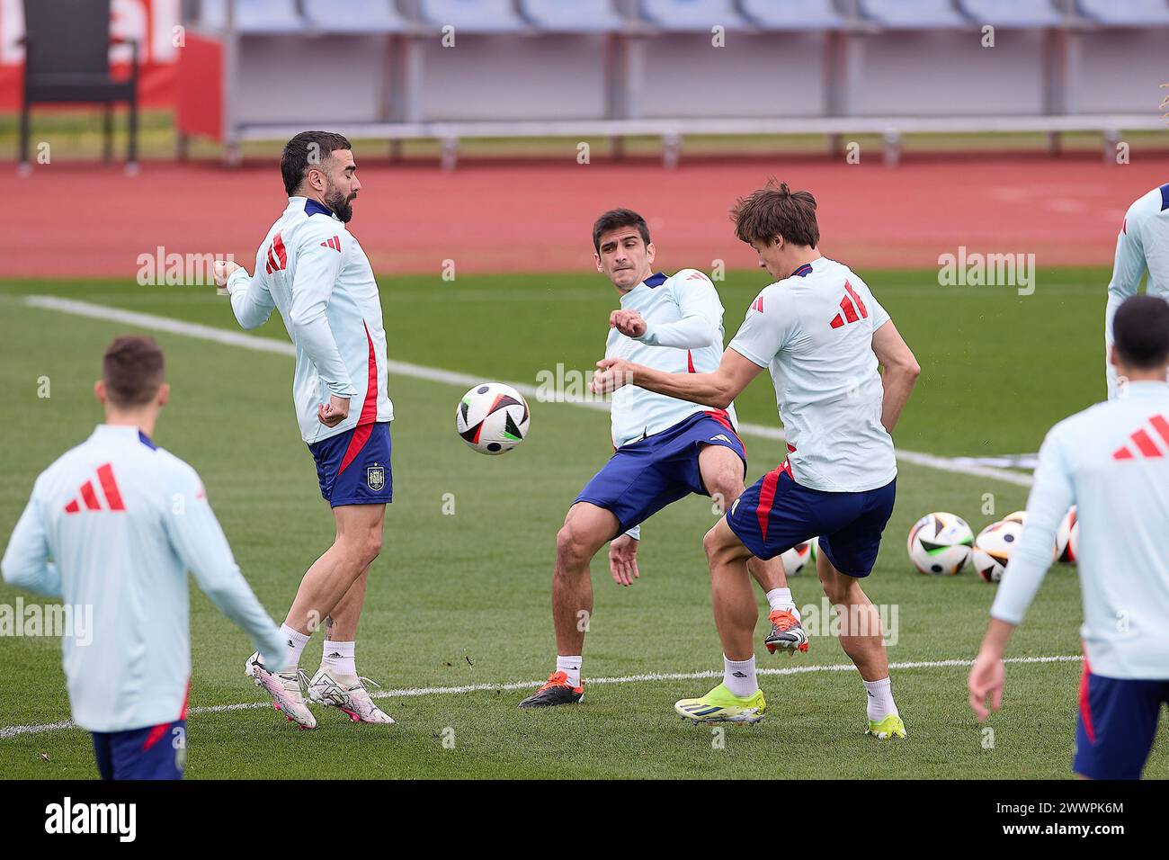 Madrid, Spain. 25th Mar, 2024. Daniel Carvajal (L), Gerard Moreno (C) and Robin Le Normand (R) of Spain warm up during the training session on the eve of the international friendly match between Spain and Brazil at Ciudad del Fútbol de Las Rozas. Credit: SOPA Images Limited/Alamy Live News Stock Photo