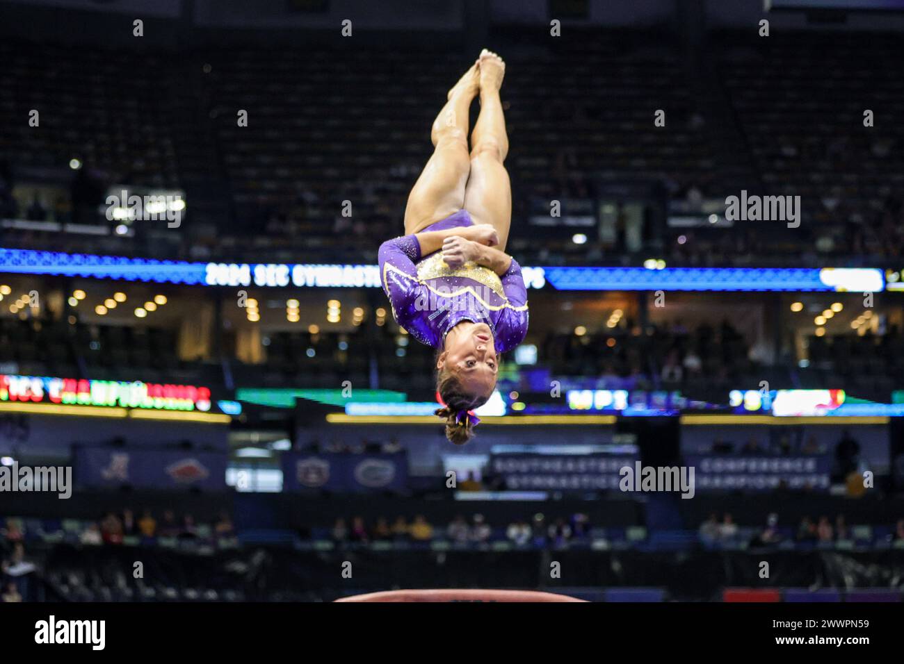 New Orleans, LA, USA. 23rd Mar, 2024. LSU's Savannah Schoenherr competes on the vault during NCAA Gymnastics action in the SEC Championships at the Smoothie King Center in New Orleans, LA. Jonathan Mailhes/CSM/Alamy Live News Stock Photo