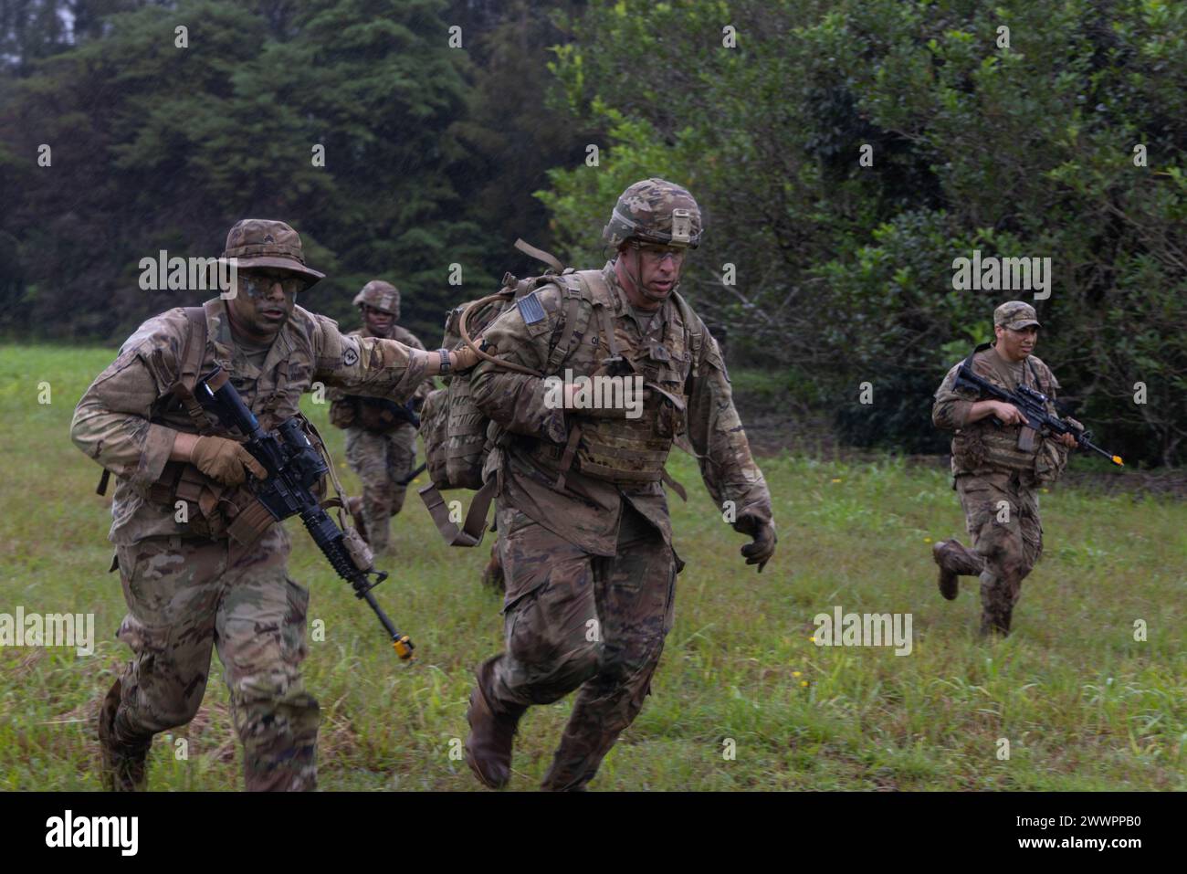 U.S. Army Chaplain Capt. Joey Quilty (Center), the 65th Brigade ...