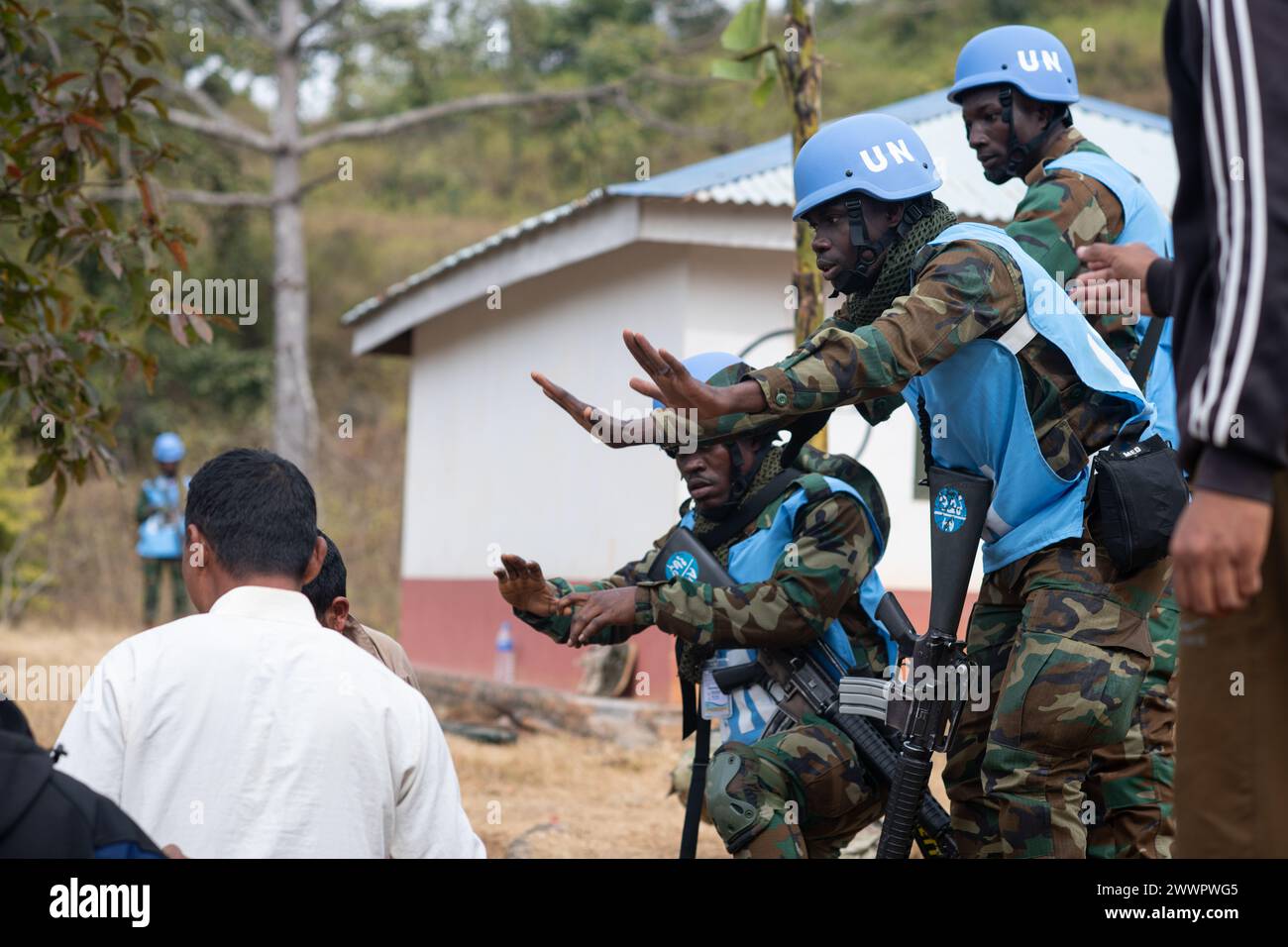 Soldiers with the Ghana Army simulate escorting civilian roleplayers