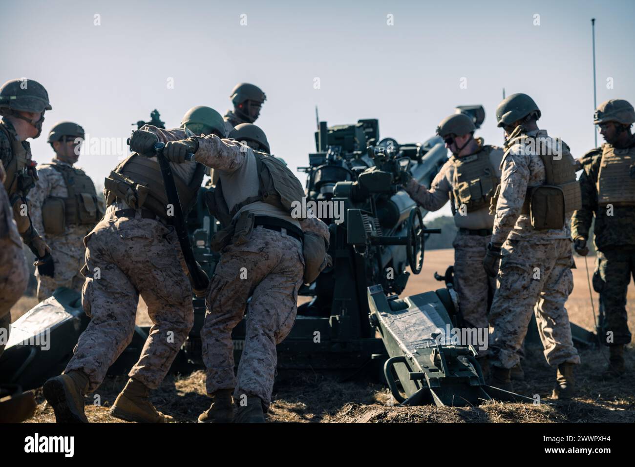 U.S. Marines with The Basic School demonstrate how to operate an M777 ...