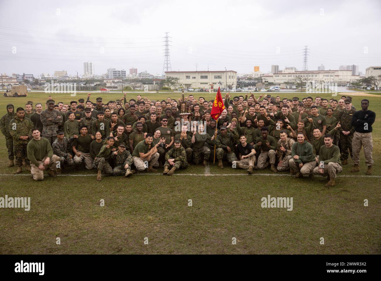 U.S. Marines with Marine Wing Support Squadron (MWSS) 172 pose for a group photo following a field meet at Camp Foster, Okinawa, Japan, Feb. 9, 2024. Marines with Marine Wing Headquarters Squadron 1, MWSS-172, and Marine Aviation Logistics Squadron 36 held the field meet to foster a sense of comradery, healthy competition, and esprit de corps between the three squadrons.  Marine Corps Stock Photo