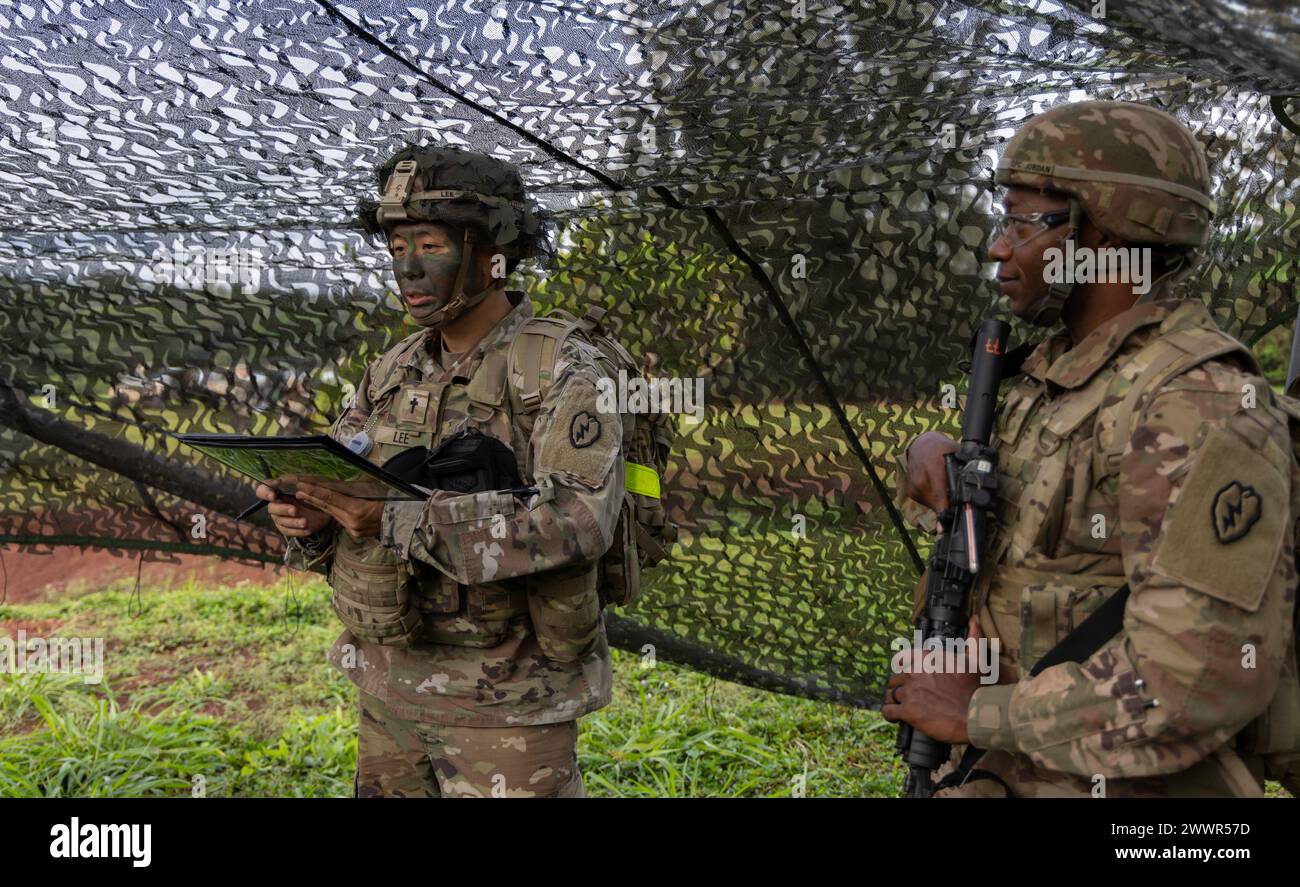 U.S. Army Chaplain Capt. Lee Lee and Sgt. Brandon Jordan, a religious ...