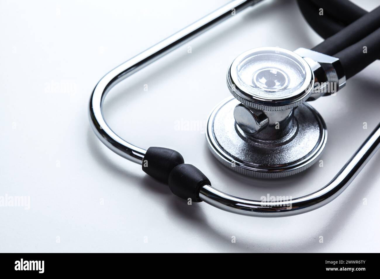 Blue stethoscope isolated on white Stock Photo - Alamy