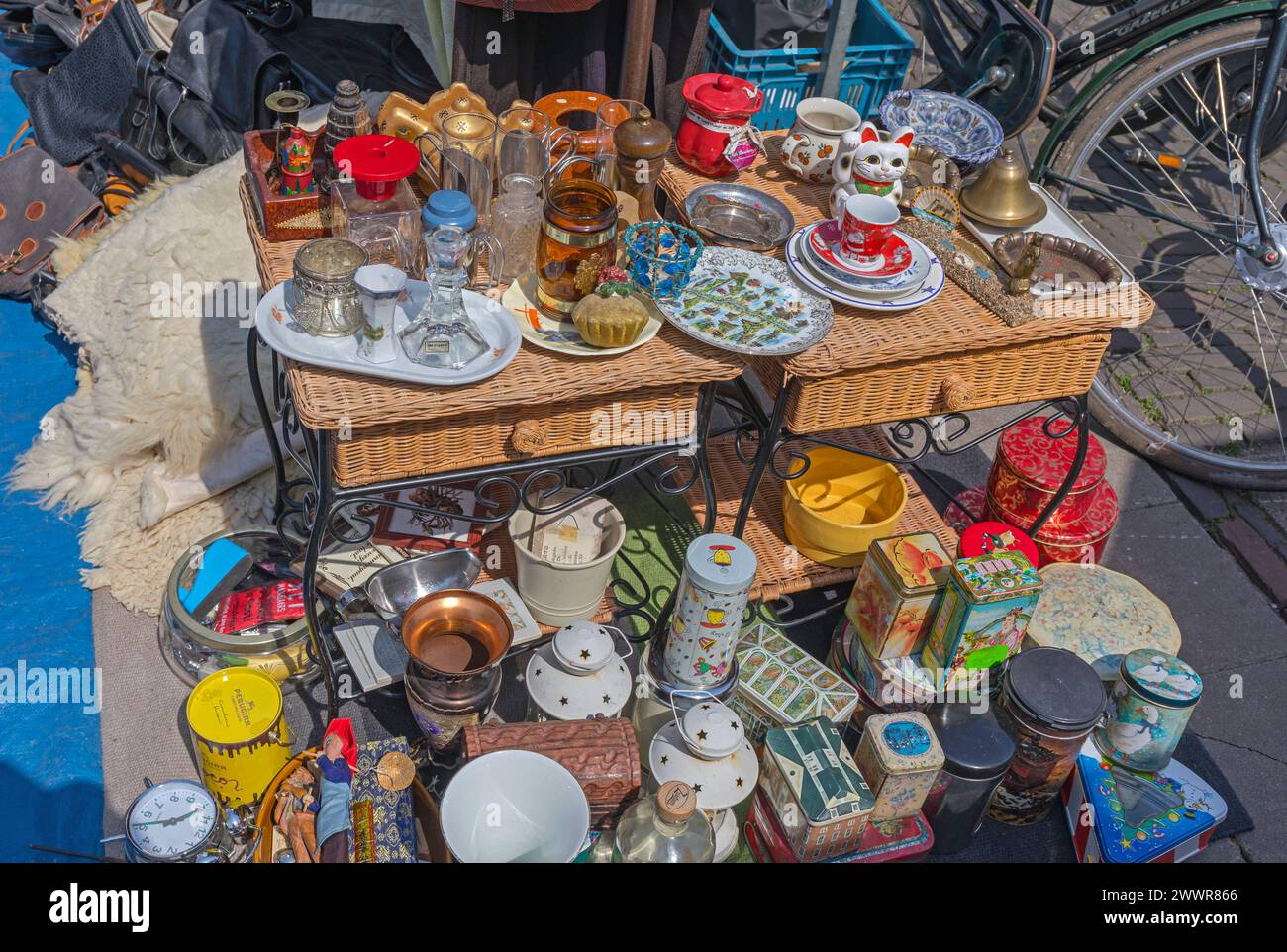 Amsterdam, Netherlands - May 16, 2018: Crockery Knick Knack Vintage Boxes for Sale at Flea Market in Old Town. Stock Photo