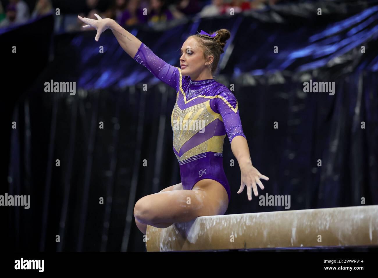 New Orleans, LA, USA. 23rd Mar, 2024. LSU's Savannah Schoenherr competes on the balance beam during NCAA Gymnastics action in the SEC Championships at the Smoothie King Center in New Orleans, LA. Jonathan Mailhes/CSM/Alamy Live News Stock Photo